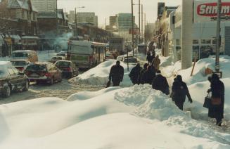 People walking south on Gower St