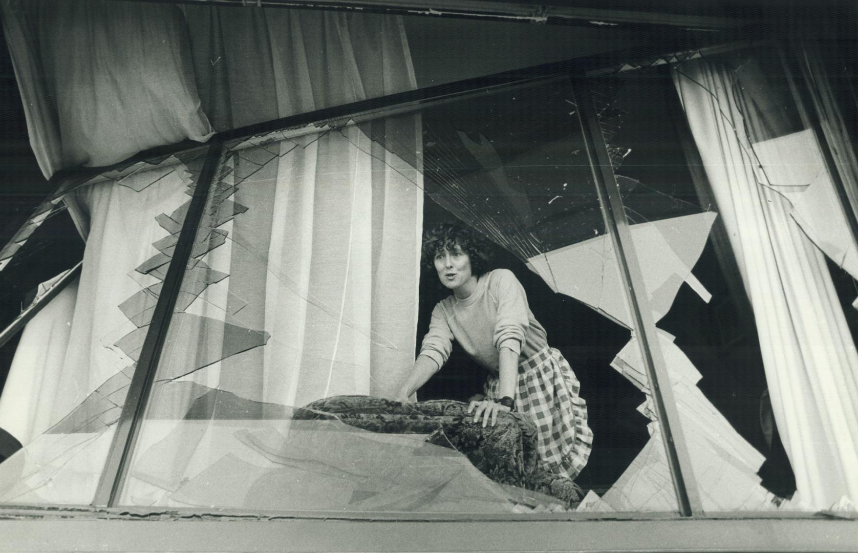 Karen Lukins can't believe what she sees through ripped out window in her Orangeville bungalow