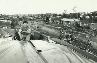 Bill Burton gets an early start on roof repairs in the Allandale area of Barrie - but he's got a long way to go
