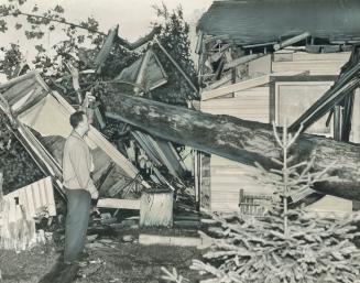Toronto Area was hit last night by a 100-mile-an-hour twister that was responsible for one deathe and caused the worst storm damage since Hurricane Ha(...)