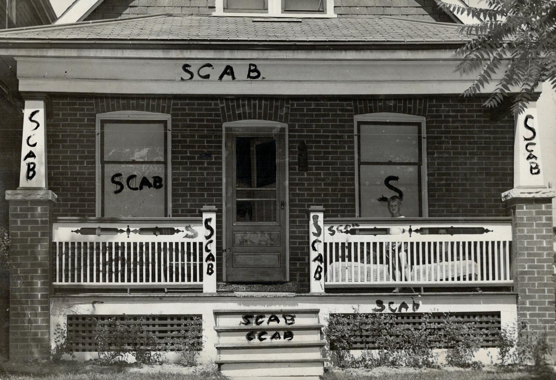 strikebreaker-s-house-is-shown-smeared-with-the-painted-word-scab-all