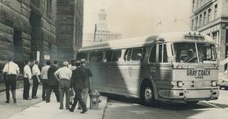 Bus carries sentenced pickets to jail from courtroom in old city hall