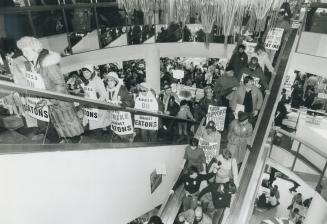 Three-hour protest: Striking Eaton's workers and supporters blocked aisles and escalators at Scarborough store
