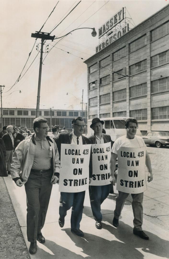 Pickets hit the street around Massey-Ferguson's sprawling Toronto plant today minutes after company's 5,700 employees in Toronto and Brantford walked (...)