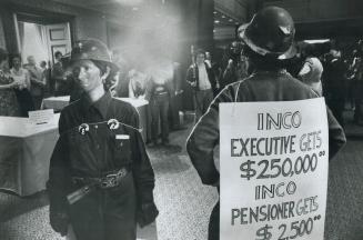 Demonstrators dress as miners to protest seven-month strike during Inco's annual meeting of shareholders today in Toronto