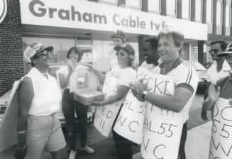Sweetness and light on picket line, The presentation of a birthday cake to smiling Gale Agostini, left, provided a welcome relief from the monotony an(...)