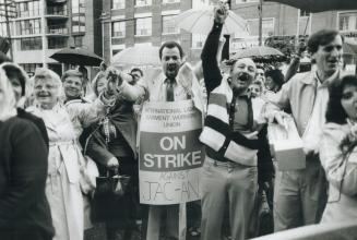 About 1,000 garment workers marched through the downtown fashion district streets today after walking off their jobs and shutting down 19 factories in(...)