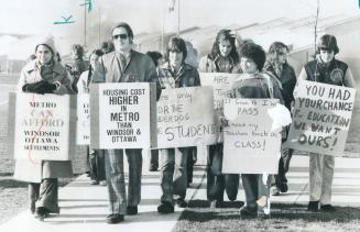 Picketing alongside striking teachers, students at L'Amoureaux Collegiate in Scarborough march with their own placards yesterday, calling for an end t(...)
