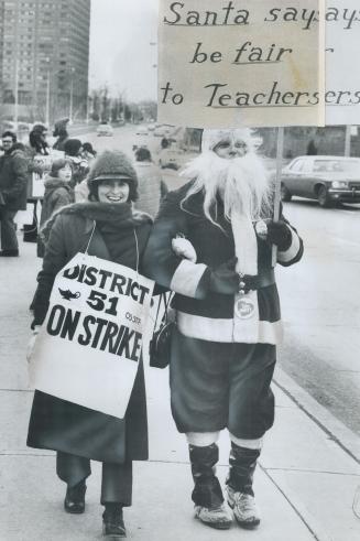 Santa Claus on the picket line yesterday at Overlea Secondary School in East York was Bill McDonald, who taught history and geography at the school be(...)