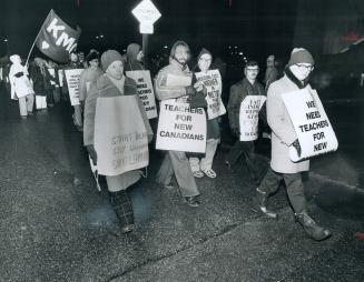 Please start talking so I can stop walking and start learning, says the sign Vincent Massey Collegiate student Bill Rodda wore outside the Etobicoke E(...)
