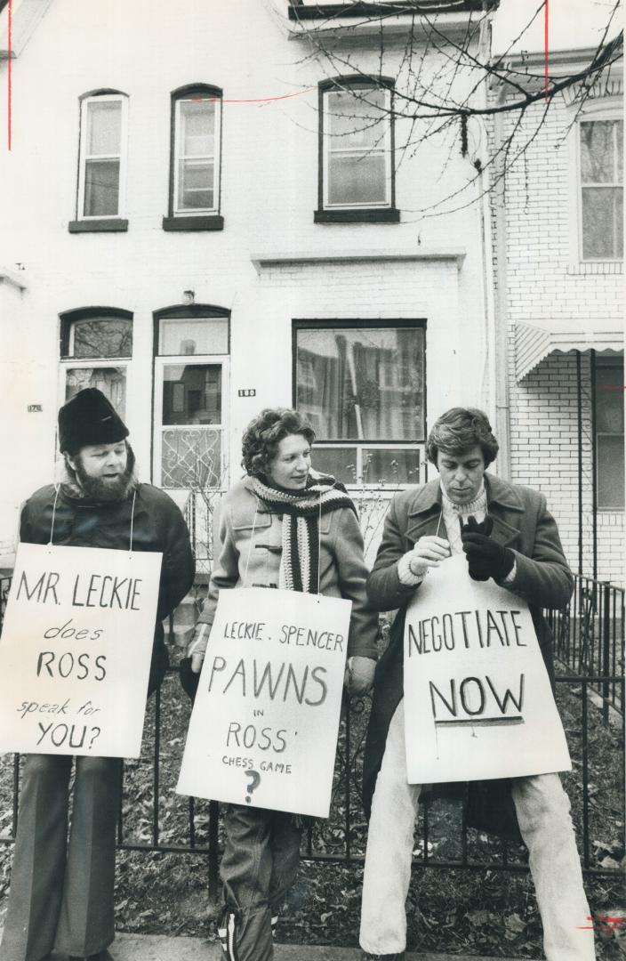 With a day off from their usual picket duties at Central Technical School three striking math teachers today picket the home of school trustee Dan Lec(...)