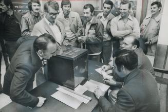 Voting on whether to end the 23-day transit strike, George Key casts a ballot in Toronto Transit Commission Russell yards at Queen St. near Coxwell Av(...)