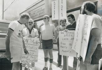 Striking drivers picket headquarters of the Halton and Mississauga Ambulance Service in Oakville