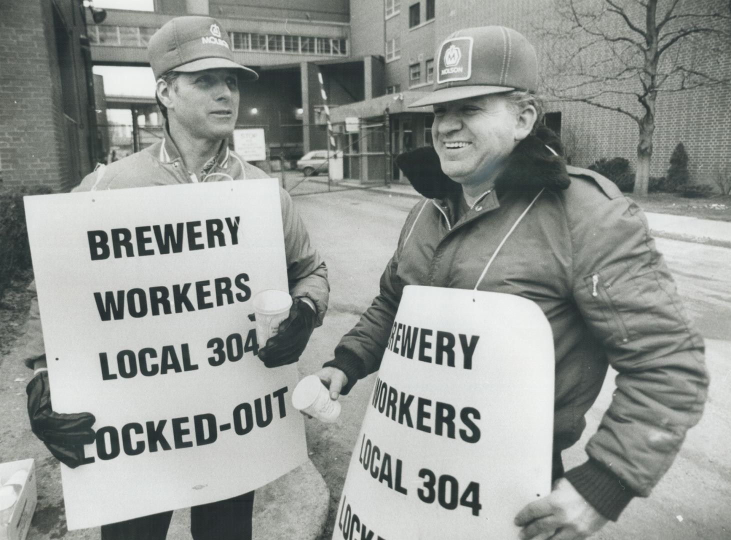 On the outside: Gilles Ste. Croix, left and Louis Turcotte were on the picket line today at Molson Ontario Breweries Ltd. on Fleet St. Ontario's big t(...)
