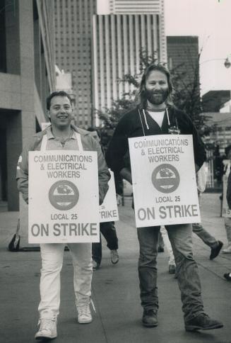 Striking bell: Off the job for the first time in eight years, Bell Canada operators and technicians set up picket lines today at the company's head office on Trinity Square