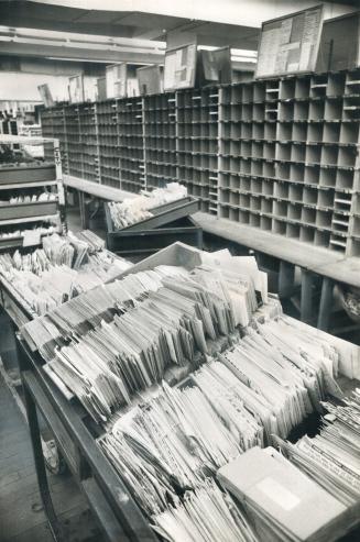 Mail is piled up unsorted in Canadian post offices