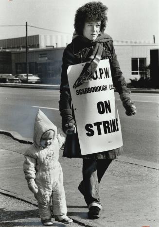 Dianne Fisher pickets with daughter Jennifer, 18 months