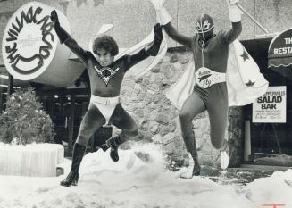 Canada's own dynamic duo, If you want to attract attention on a Toronto street when everybody's preoccupied with cleaning up the snow, you've got to wear flamboyant clothes
