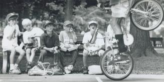 Feeding on the fantastic, Young gents attending the Kew Beach sports camp munch on their lunches and are properly awed and respectful as they are trea(...)