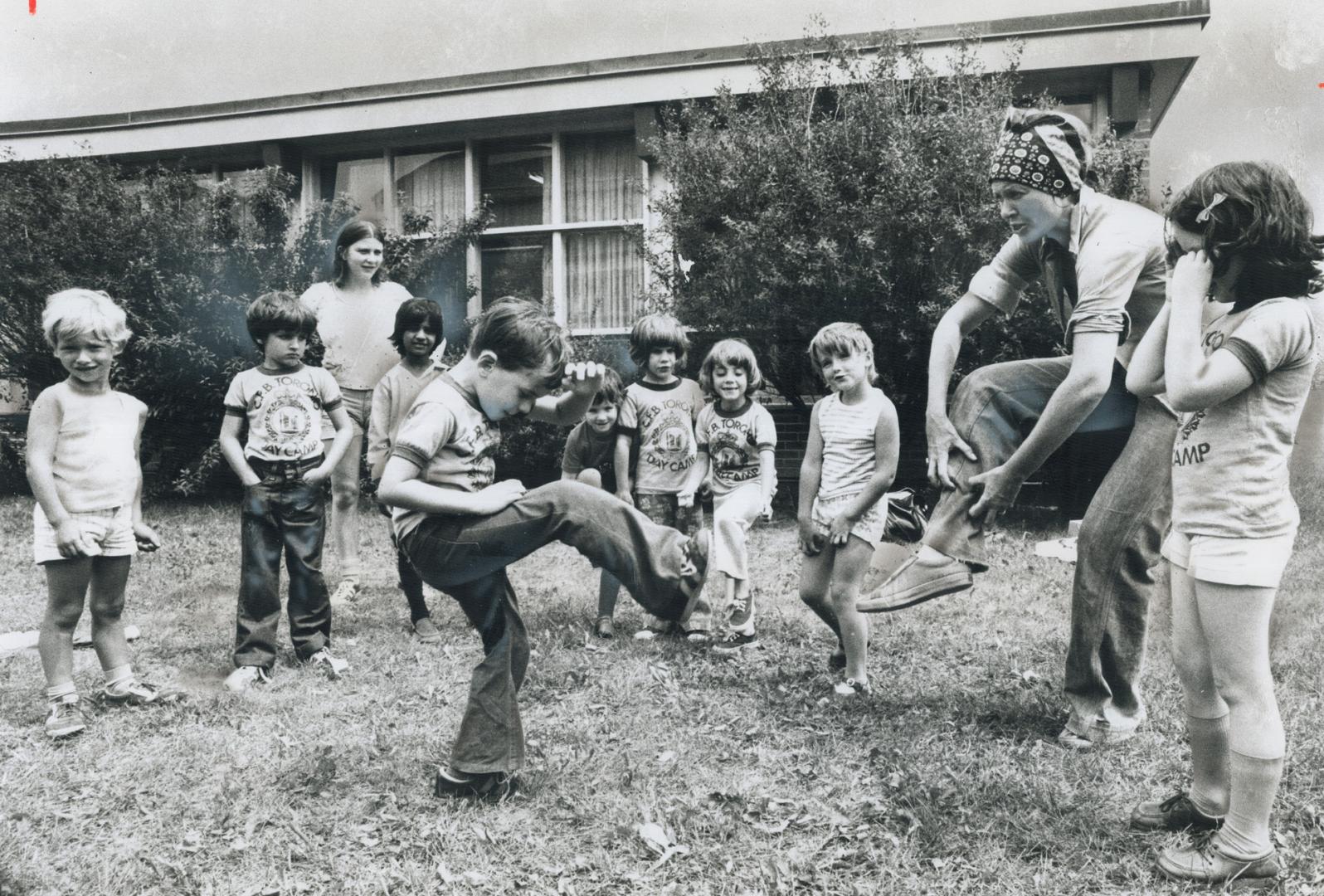 In the drama group at the Downsview day camp sponsored by the Canadian Armed Forces, 5-year-old Christopher Locke acts out a soldier putting on his un(...)