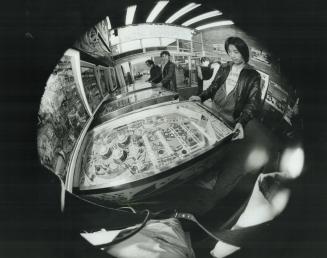 A hot night in the life of a pinball addict, Gordy Leong, 17, is a pinball addict who said he changed schools to get away from a gang that skipped classes to hit the local pinball joints
