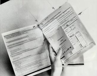 First thing for novice tax-filers to do is remove tax booklet's centre section - that's the actual return, with an envelope you use for mailing the return