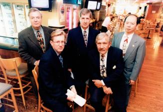 Fuming over law: Group seeking an impact study on smoking ban includes: In back row, from left, Kirk Shearer, Rod Seiling and Henry Wang, and front row, from left, Paul Oliver and Wally Majesky