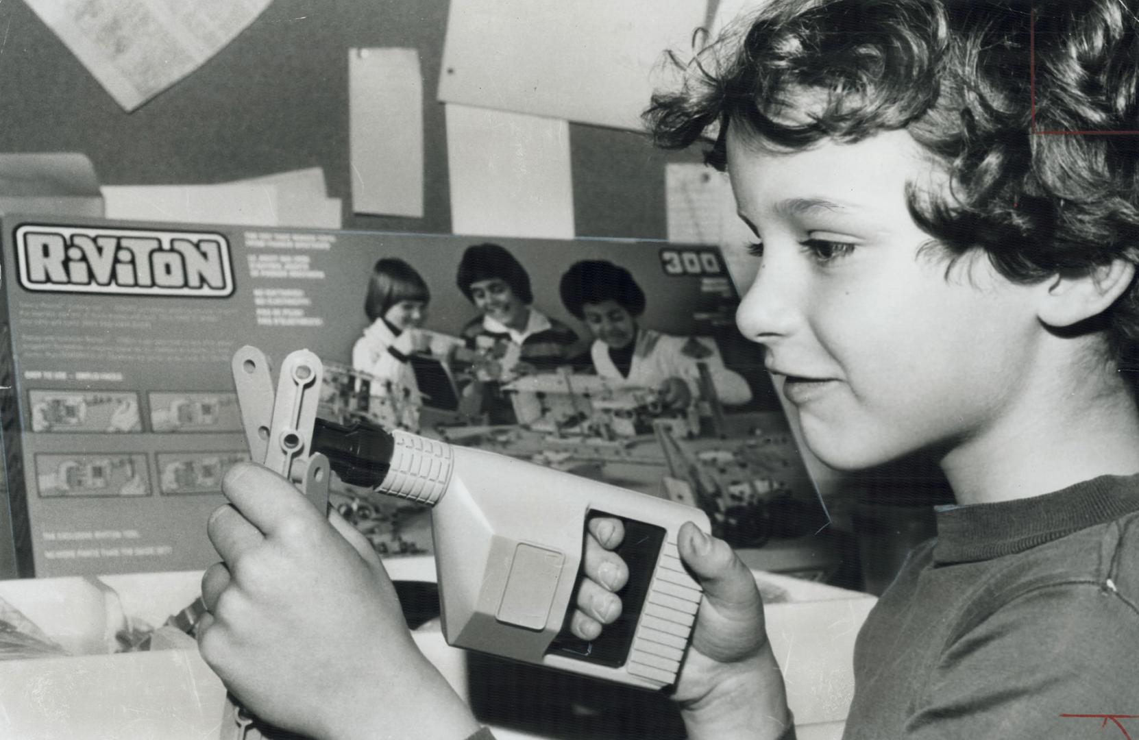 Dangerous Toy, Matthew Vienneau holds a Riviton construction set toy which is being pulled from store shelves across Canada by its manufacturer