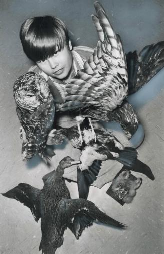 Taxidermist at 13, Roy Huemmer shows some of his specimens