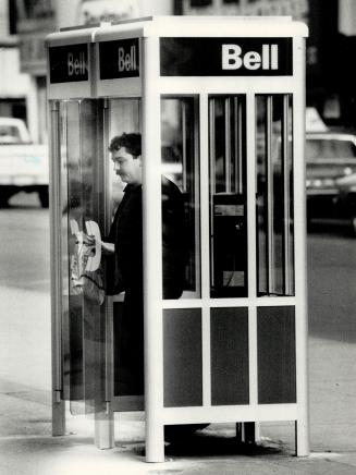 Sound of silence, A new, noise-proof phone booth debuts in fron of the Eaton Centre yesterday
