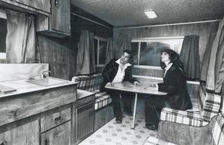 At Normal Trailer-size, this recreational vehicle is occupied by Norman Leclerc, sales manager of the Quebec Bonair manufacturer, and Brigitte Krause,(...)