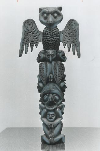 Elaborate Carving of a totem pole takes Marcel Stalder about 40 hours