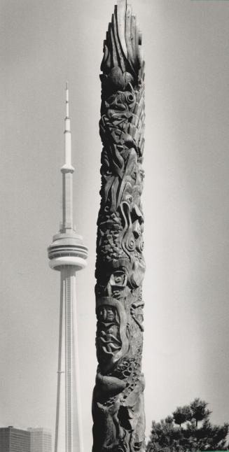 Towering totems, The CN Tower has a little competition - from this camera angle anyway - from a totem that stands in Little Norway Park at the foot of Bathurst St
