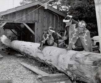 Chief Mungo and sons carve the world's largest totem pole and its twin