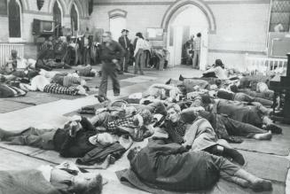 A familiar scene at All Saints' Friendship Centre, scores of homeless setting in for a night on the floor