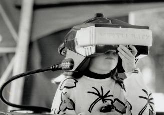 Out of here: Erinn Di Staulo, 11, enters Virtuality's alternate reality