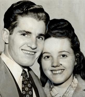 More than 500 letters were written by attractive Tony Vanaken, 21, from Amsterdam, to her fiance, George Pay, 23, Humberside Ave., seen with her, at l(...)