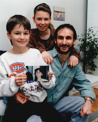 Anxious: Laurier Lanteigne, with 11-year-old son Michael, left, and daughter Melanie, 12, waits for the return of his wife Sheila