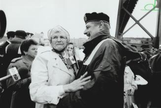 Kisses amid tears: Kisses and tears of joy were the order of the day as family and friends greeted 865 warship crew members home from the gulf after 7 1/2 months