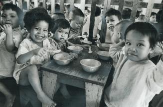The meals at the Govap Orphanage near Saigon are simple and meager, some of the youngsters are painfully thin