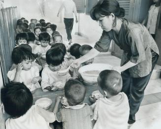 Viet Nam orphans such as these can be helped by the donation of unneeded family allowance cheques, suggests one reader in accompanying letter. Student(...)