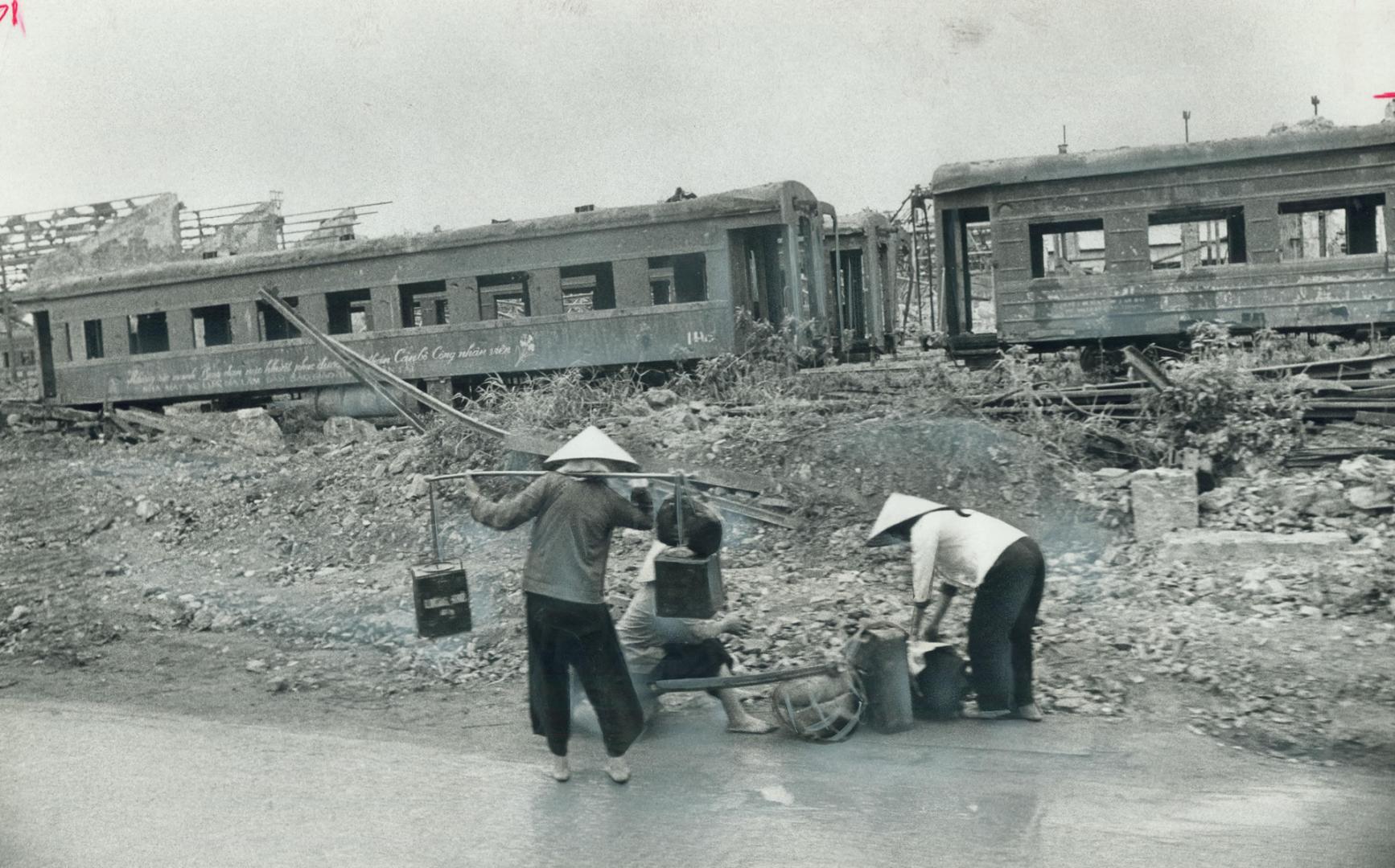 The railway yard and repair shops in Hanoi were hit by what the U