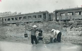 The railway yard and repair shops in Hanoi were hit by what the U