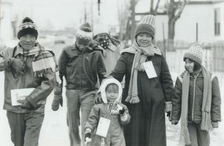 The Bay Ong family walking from mess hall at the Longue Pointe military base
