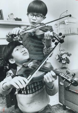 Their Violins accompanied youngsters Phuoc and Vu Nguyen when they fled Viet Nam with their family