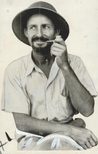 John W. Morrill, left, made his escape from Corregidor in a small boat and 31 days later reached Australia