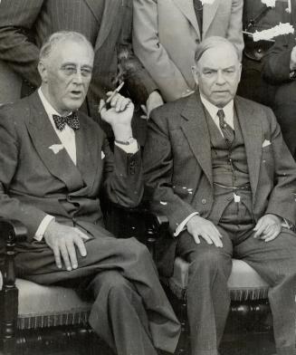 Prime Minister King, shown here with President Roosevelt, took part in the press conference, said Canada will be a partner in the coming undertakings against Japan