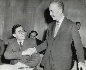 Russia's Andrei Gromyko shakes hands with Britain's Sir Alexander Cadogan before United Nations security council session in which they tangled with ve(...)