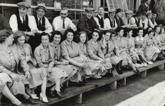 The brief simple ceremony was attended by hundreds of workmen, who quit their jobs for a few moments to witness the dedication of the first-fruits of (...)