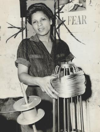 Miss Negro War Worker of the U.S. is Belle Calloun, chief wire machine operator in a war plant